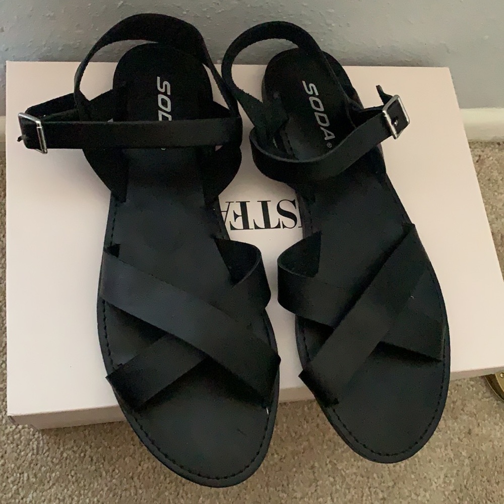 Black strapping sandals